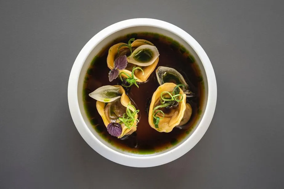 Tortellini in a dark broth